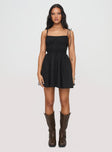 front view of model wearing Princess Polly Jacksonne Mini Dress Black Petite Square Neck 