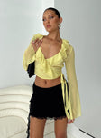 Front view of model wearing  front Princess Polly Full Sleeves Square Neck  She's Mine Frill Wrap Top Yellow