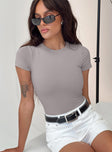 front view of model wearing Princess Polly Attice Bodysuit Soot Short Sleeves Crew Neck 