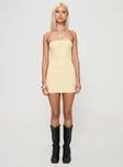 side view of model wearing Princess Polly Savins Strapless Mini Dress Yellow Straight Neck 