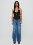 front view of model wearing Princess Polly Serenitia Mid Rise Relaxed Jeans Mid Blue Wash Mid Rise 