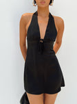 front view of model wearing Princess Polly Lanier Mini Dress Black Petite Plunger 