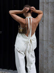 back view of model wearing Princess Polly Hills Halter Top Porcelain Sleeveless Plunger 