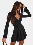 Front view of model wearing  front Princess Polly Asymmetric Neckline  Canino Long Sleeve Mini Dress Black