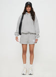 front view of model wearing Princess Polly Princess Polly Hooded Sweatshirt Puff Text Grey 