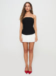 front view of model wearing Princess Polly Obsessed Strapless Mini Dress Black Straight Neck 