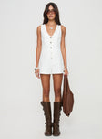 Playsuit Fixed shoulder straps, scooped neckline, button fastening down front Non-stretch material, unlined 