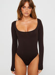 front view of model wearing Princess Polly Ellery Bodysuit Brown Full Sleeves 