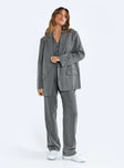 Blazer Pinstripe print Lapel collar Button fastening at front Faux chest pocket Twin front pockets Split at back