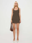 side view of model wearing Princess Polly Serina Polka Mini Dress Brown / White Scoop Neck 