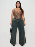 front view of model wearing Princess Polly Ziggie Low Rise Ultra Baggy Jeans Antique Wash Curve High Waisted 