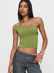 side view of model wearing Princess Polly Irina Multi-wear Top Green Sleeveless Asymmetric Neckline 