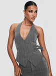 front view of model wearing Princess Polly Calexico Buckle Halter Top Grey Pinstripe Sleeveless V-Neck 