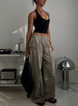 side view of model wearing Princess Polly Paltrow Cargo Pant Washed Brown Petite 