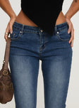 front view of model wearing Princess Polly Bethany Bootleg Low Rise Jeans Mid Wash High Waisted 