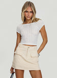 front view of model wearing Princess Polly Cadern Skort Cream High Waisted Shorts 