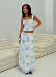   side view of model wearing Princess Polly Modern Girl Maxi Skirt White / Blue Floral Maxi 