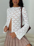 front view of model wearing Princess Polly Streep Crochet Top White Full Sleeves Crew Neck 