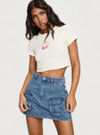   side view of model wearing Princess Polly Chillders Denim Mini Skirt Mid Wash Tall Mini Skirts 