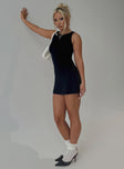 side view of model wearing Princess Polly Karreey Mini Dress Black Petite Crew Neck 