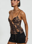 side view of model wearing Princess Polly Mariah Top Leopard Sleeveless Plunger 