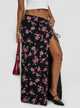 back view of model wearing Princess Polly Rhomana Maxi Skirt Black Floral Maxi 