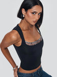 side view of model wearing Princess Polly Xandi Top Black Leopard Sleeveless Square Neck 