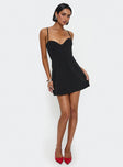 side view of model wearing Princess Polly Rummy Mini Dress Black Sweetheart Neckline 