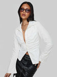 front view of model wearing Princess Polly Fleiry Long Sleeve Top White Full Sleeves V-Neck 