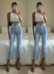 Front view of model wearing  front Princess Polly High Waisted  Angela Cropped Jeans Light Wash Denim