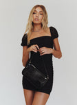 Front view of model wearing  front Princess Polly Sweetheart Neckline  Charvi Mini Dress Black Tall