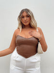 Front view of model wearing  front Princess Polly Sleeveless Plunger  Jessica PU Bustier Brown