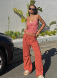 back view of model wearing Princess Polly Miami Vice Pants Red Mid Rise 