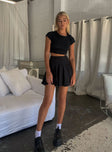 Front view of model wearing  front Lucid Mini Skirt Black Princess Polly  Mini Skirts 