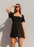 Front view of model wearing  front Princess Polly Square Neck  Summer Nights Mini Dress Black Petite