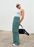 Green pants Cord material  Zip & button fastening  Belt looped waist  Four pocket design  Faux flap pockets on leg  Wide leg 