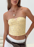 Floral print tube top Inner silicone strip at bust, pinched detail with bow Good stretch, fully lined