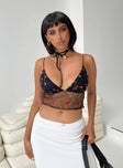 Black crop top Mesh material Floral embellishments  Elasticated shoulder straps Plunging neckline Invisible zip fastening at side Good stretch Lined bust