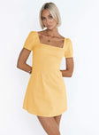 Yellow mini dress Square neckline Inner silicone stripe at bust and shoulders Invisible zip fastening at back 