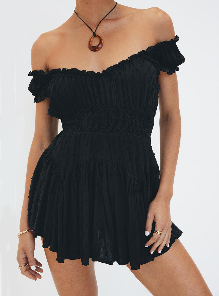 Black mini dress Shirred waistband Ruffle detailing Elasticated neck and sleeves Can be worn on or off shoulder Built in shorts Layered ruffle hem Fully lined