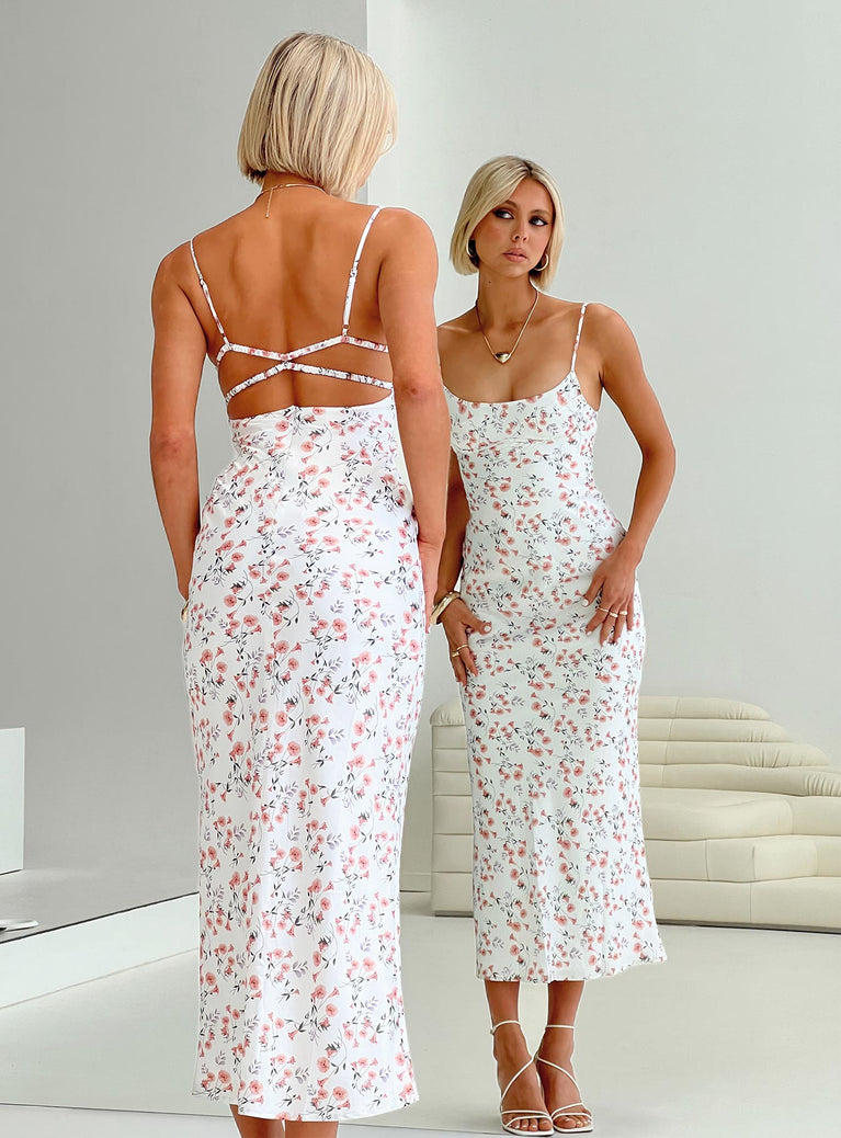 Floral maxi dress Adjustable shoulder straps, scooped neckline, invisible zip fastening Non-stretch material, unlined