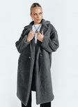 Coat Collared neckline Front button fastening Twin side pockets