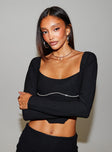 Long Sleeve Top Square neckline, boning at waist, diamonte detail around bust  Elasticated shoulders and back, crop style  Inner silicone strip at shoulders, zip fastening at back