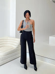 Pants High rise Belt looped waist Zip and button fastening  Four pocket design Tie fastening at side Wide leg 