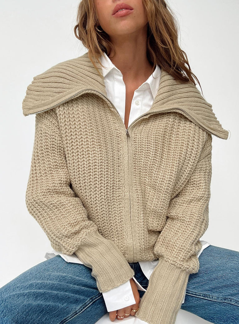 Beige sweater Knit material Oversized collar Zip fastening at front Good stretch Unlined 