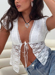 Lace crop top Plunging neckline, tie fastening at bust, pointed hem