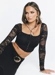 Long sleeve top Sheer lace material Square neckline Hook and eye fastening at front