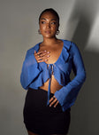 Blue long sleeve top Sheer material Frill neckline & hem Tie fastening at bust Flared sleeves Non stretch Unlined