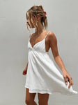 Mini dress Muslin look material Adjustable shoulder straps   Plunging neckline Ruffle detail  Elasticated back