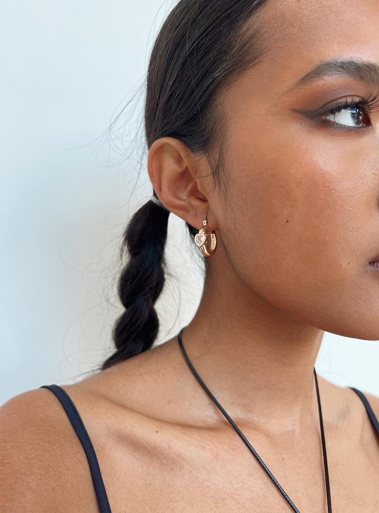 Gold-toned earrings Hoop design, clasp fastening, diamante detail